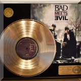 C55. Bad Meets Evil gold record. 